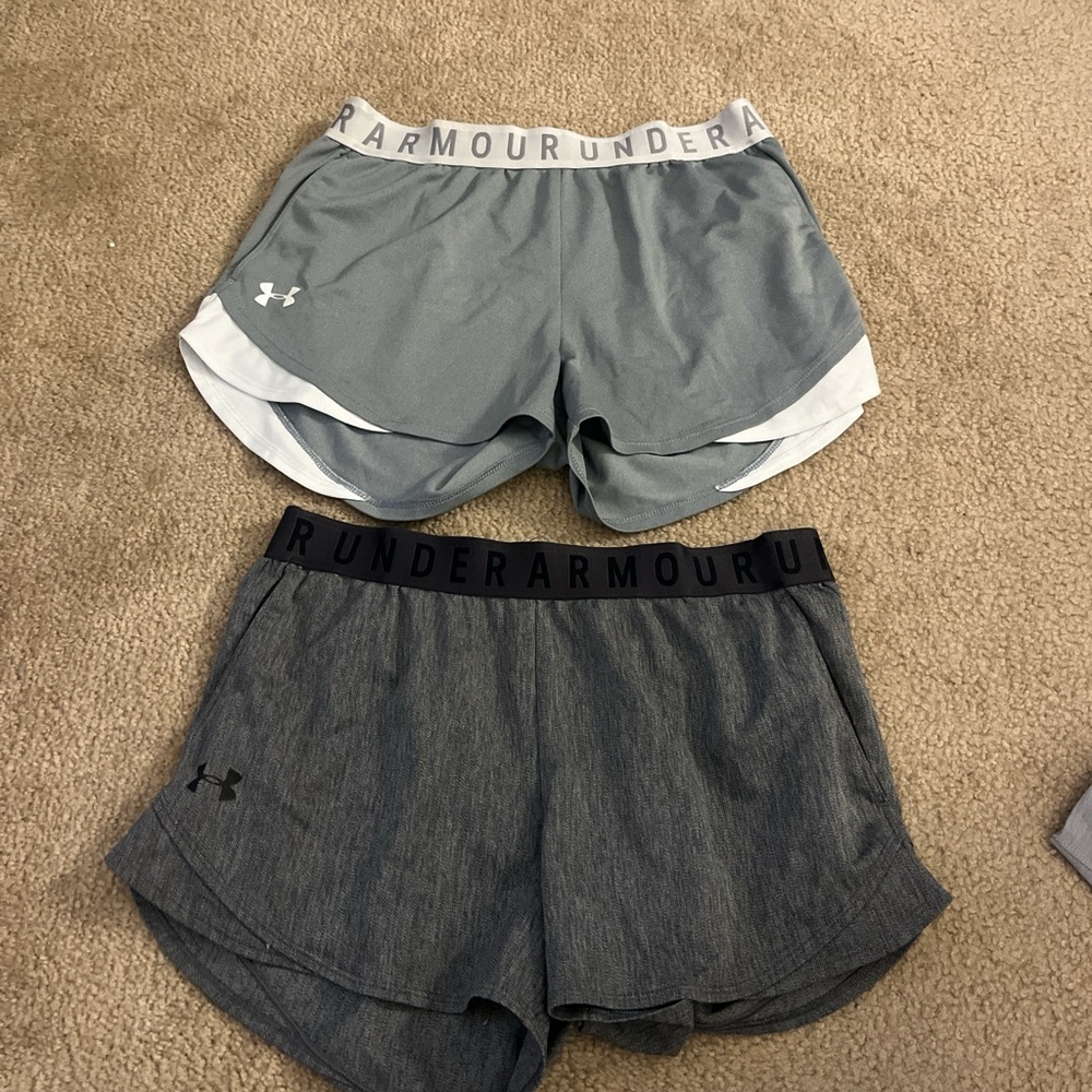2 Pairs of under Armour, gray athletic shorts